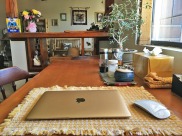 The laptop on my small kitchen table ... office